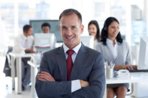 Smiling Manager Leading His Team In An Office